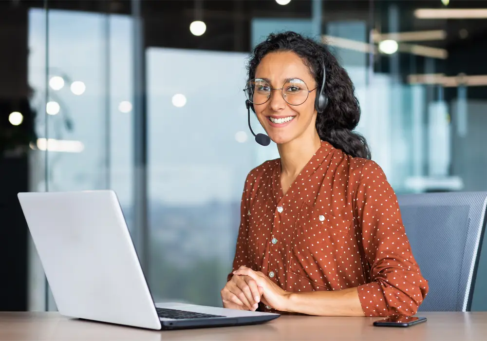 Lebanese marketing agency consultant in front of her laptop